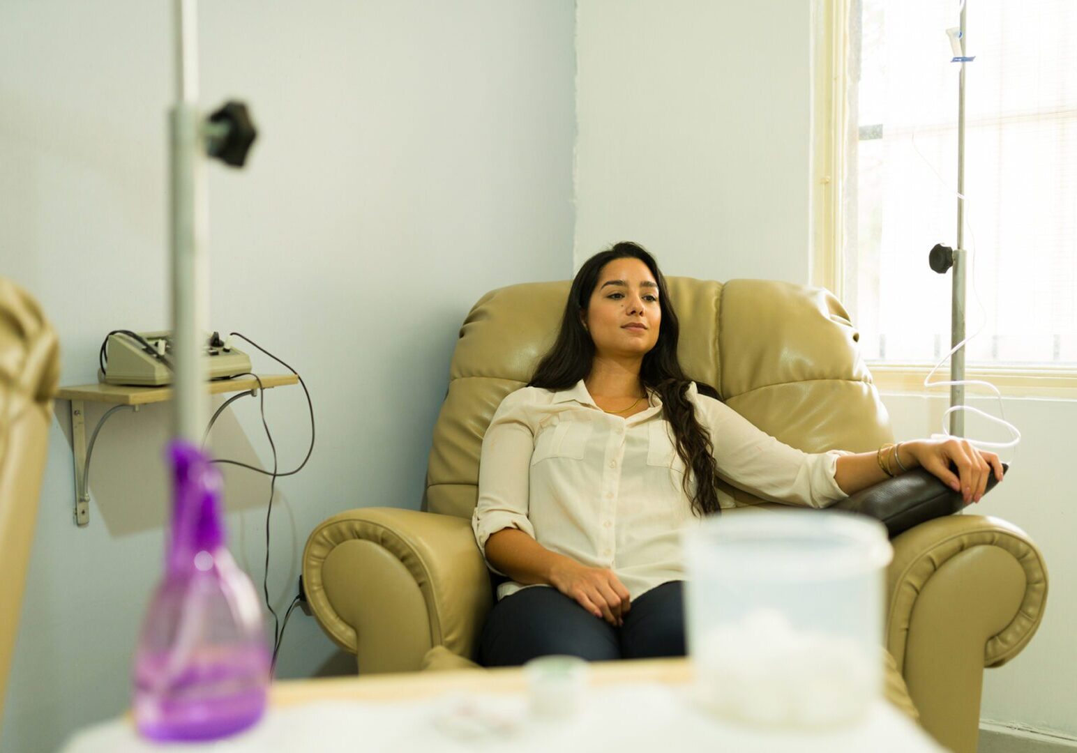 Nurse preparing IV hydration therapy at home Kansas